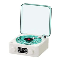 Mini Bluetooth speaker with retro design and white noise functionality for stylish audio.