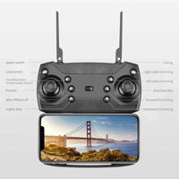 4K camera drone E88 Pro remote control with smartphone display for aerial photography and video streaming.