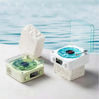 Mini Bluetooth speaker with retro design and white noise functionality on display by the water.