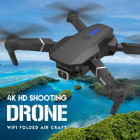 4K camera drone E88 Pro in flight above tropical scenery with Wi-Fi FPV capabilities and compact foldable design.